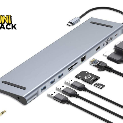 A silver aluminum multi-port USB hub with attached black cables, shown on a white background with the Kiwi Shack logo in the top-left corner. The hub includes USB-A, USB-C, Ethernet, HDMI, and DisplayPort ports, along with a 3.