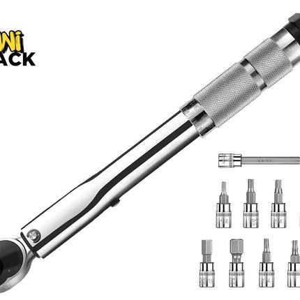 A chrome click torque wrench with a knurled adjustable handle and a ratchet head, accompanied by an extension bar and a set of assorted bit sockets displayed on the right, featuring a "Kiwi Shack" logo in the top left corner.