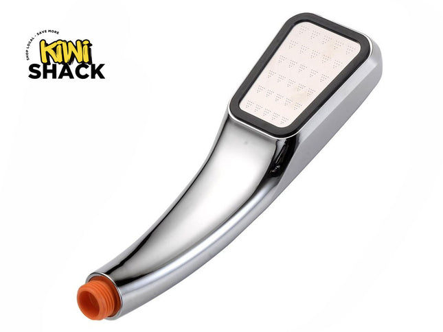 A chrome handheld shower head with a rectangular spray head and an orange male connector at the tip, shown on a white background with the Kiwi Shack logo in the top-left corner.