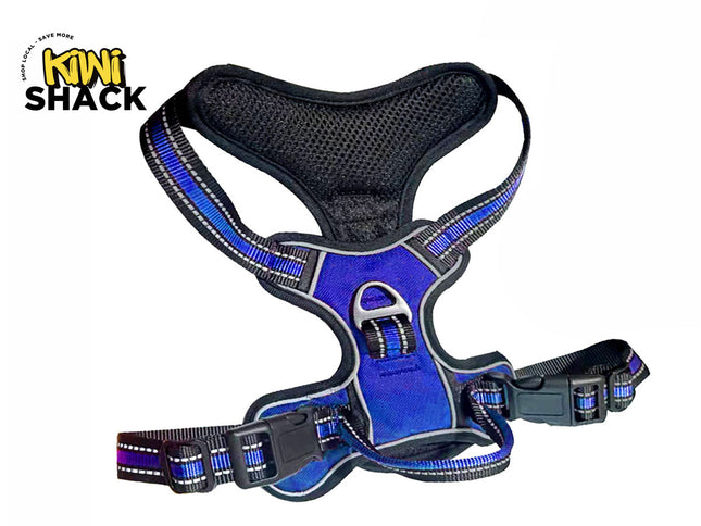 A blue and black dog harness with reflective trim, shown on a white background with the KINI SHACK logo in the top-left corner.