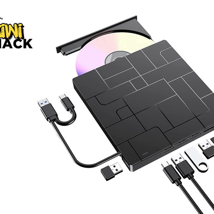 Black external portable DVD burner drive with open tray, shown with USB cables, a USB flash drive, and an SD card on a white background. Kiwi Shack logo is visible in the top-left corner.