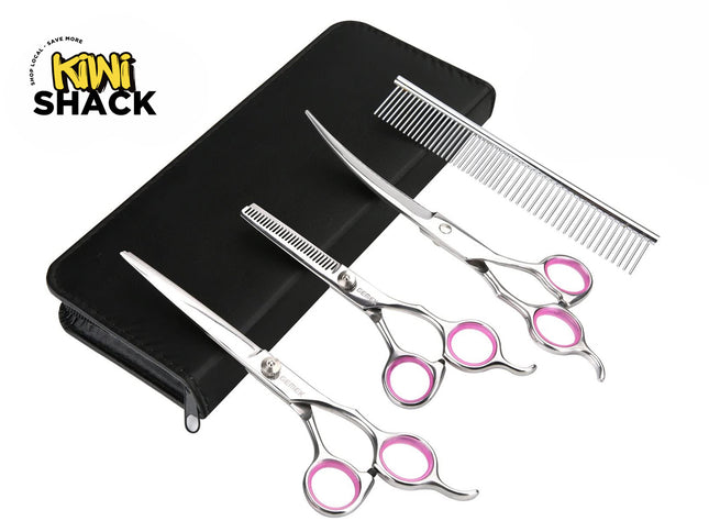 A set of stainless steel pet grooming scissors, thinning shears, and a metal comb with pink finger rings, arranged next to a black zipper case, featuring the "Kiwi Shack" logo in the top-left corner.