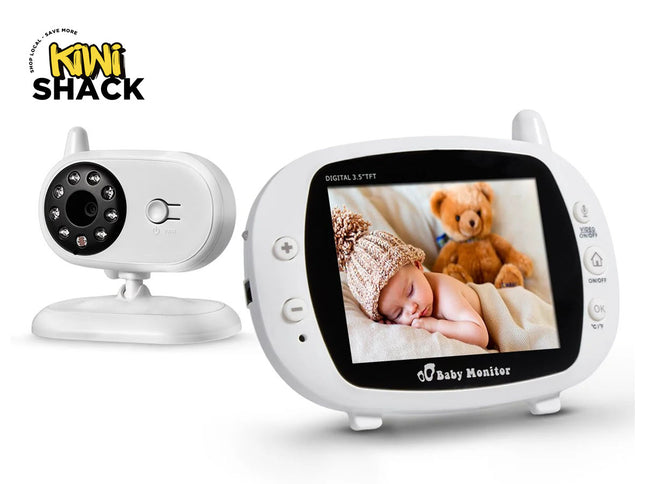 Baby monitor with screen displaying a child and teddy bear, branded as Kiwi Shack.