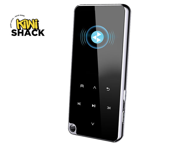 A black portable media player with a glossy screen and silver metallic edges, shown at an angle on a white background with a Kiwi Shack logo in the top-left corner.