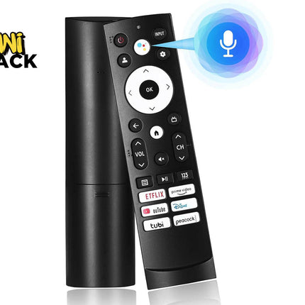 Black voice-enabled streaming TV remote with a circular directional OK pad, Google Assistant voice button with graphic badge, streaming shortcut keys for Netflix, Prime Video, YouTube, Disney+, Tubi, Peacock, curved body, and Kiwi Shack logo in top left.