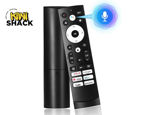Black voice-enabled streaming TV remote with a circular directional OK pad, Google Assistant voice button with graphic badge, streaming shortcut keys for Netflix, Prime Video, YouTube, Disney+, Tubi, Peacock, curved body, and Kiwi Shack logo in top left.