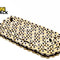 Coiled gold-tone heavy-duty drive chain / motorcycle chain with dark pins/rivets, neatly folded/layered flat, and the Kiwi Shack logo watermark.