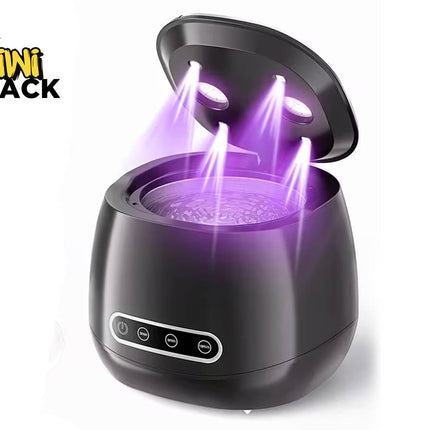 Black ultrasonic jewelry/lens cleaner machine with open lid showing purple ultraviolet disinfecting lights beaming down into a vibrating water basin, front control panel with timer buttons, and Kiwi Shack logo in top left.