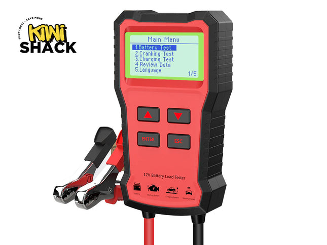 Red battery load tester with digital display on a white background, featuring the Kiwi Shack brand.