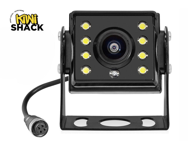 A black rectangular backup camera with surrounding LED night-vision lights mounted in a U-shaped metal bracket, featuring an attached cable with a 4-pin connector, set against a white background with the "Kiwi Shack" logo in the top left corner.