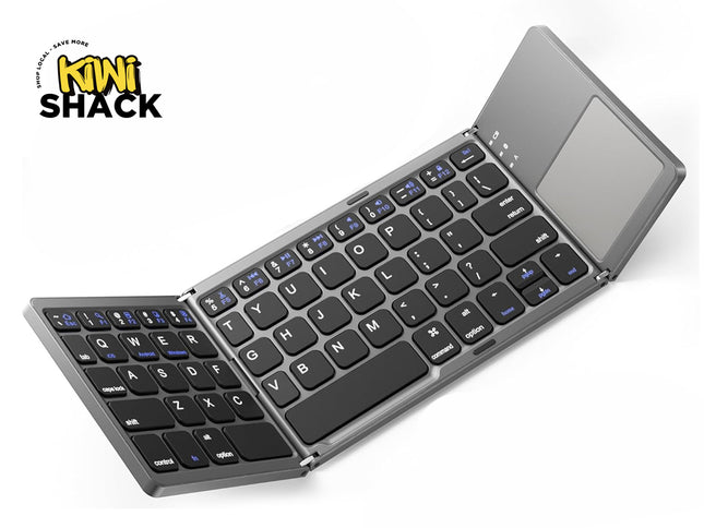A compact gray tri-fold wireless Bluetooth keyboard with black keys and an integrated touchpad on the right section, featuring a "Kiwi Shack" logo in the top left corner.