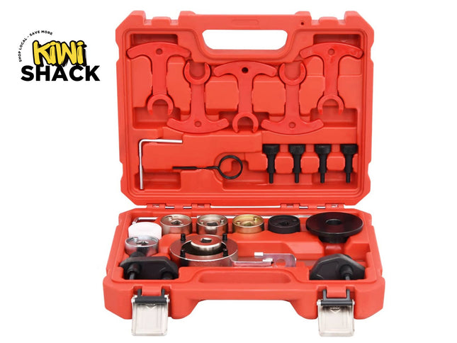 An open red plastic tool case containing a set of mechanical hand tools, including wrenches, sockets, and ring wrenches, on a white background. The Kiwi Shack logo is visible in the top-left corner.