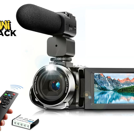 Digital camera with microphone, remote control, and battery pack on a white background with 'Kiwi Shack' branding.