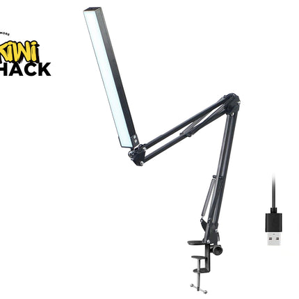 Black adjustable desk lamp with USB cable on a white background, featuring Kiwi Shack logo.