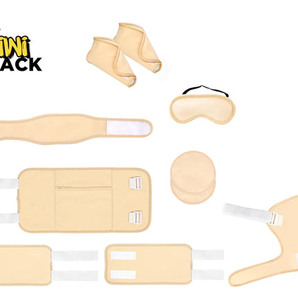 A multi-piece beige support and comfort set by Kiwi Shack, including a waist wrap, ankle sleeves, a head/neck support wrap, a circular cushion, a sleep mask, and a leg wrap, arranged on a white background.