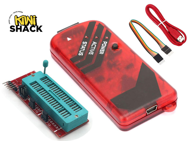 A red translucent electronic programmer device with a black status LED and white printed labels, shown with a turquoise ZIF connector board and a red USB cable on a white background. The Kiwi Shack logo is visible in the top-left corner.