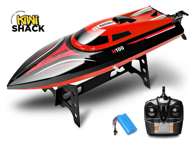Red and black high-speed RC boat with remote control and battery on a white background, featuring the Kiwi Shack brand.