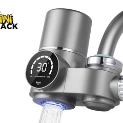 Grey faucet water filter unit attached to a chrome gooseneck faucet, featuring a circular LED display showing '30' and 'Filter Lifespan 100%', a side control knob, and water dispensing from the 'Filtered' outlet with a blue light, all branded with the Kiwi Shack logo watermark.