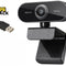 A black mini USB webcam with a clip-on stand, shown alongside its USB connector cable. The brand logo 'Kini Shack' is visible in the top left corner on a plain white background.