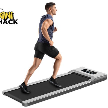 Person using a portable treadmill with Kiwi Shack logo
