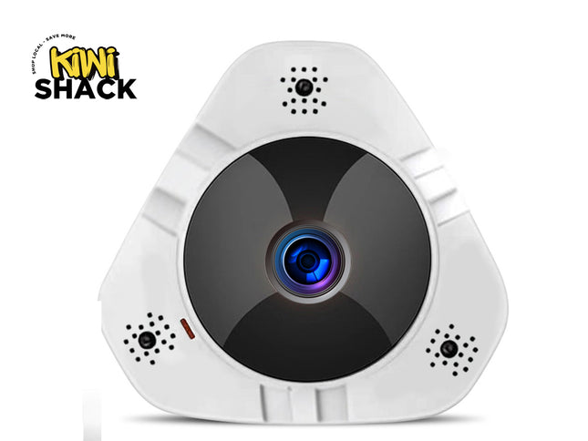A white triangular security camera with a large black circular face, blue and purple lens center, and four small speaker grilles, shown on a white background with a Kiwi Shack logo in the top-left corner.