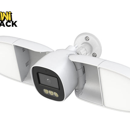 White outdoor security camera with dual lens on a white background, featuring the Kiwi Shack logo.