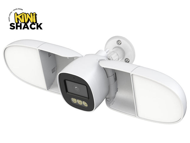White outdoor security camera with dual lens on a white background, featuring the Kiwi Shack logo.