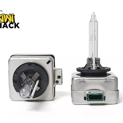 Two car headlights with a Kiwi Shack logo on a white background