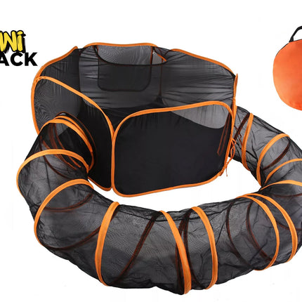 Black mesh play tunnel with bright orange trim, shown partially unfolded on a white background, with a small orange carrying bag in the upper right and the KiNi ShAcK logo in the upper left.