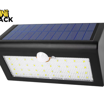 Kiwi Shack outdoor waterproof solar security wall light with motion detector and bright LED panel.