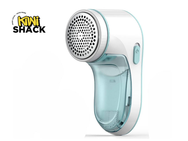 Handheld fabric shaver with clear body and white top on a white background, featuring Kiwi Shack logo.