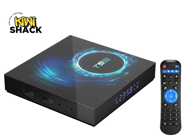A black TiviBox smart TV box with a glossy finish and blue circular graphic on top, shown next to its matching black remote control. The Kiwi Shack brand logo is visible in the top-left corner.
