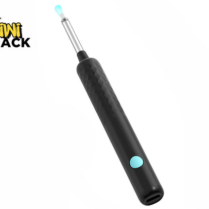 A black electronic earwax removal tool with a textured handle, a turquoise power button, and a metal tip featuring an illuminated teal silicone scoop, set against a plain background with the "Kiwi Shack" logo in the top left corner.