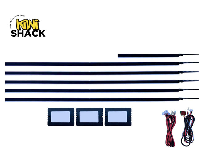 A set of automotive light bars and control modules from Kiwi Shack, displayed on a clean white background. The kit includes five long black light bars, three rectangular black modules with light blue lenses, two wiring harnesses with red and black wires, and the Kiwi Shack logo in the top left corner.