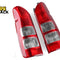A pair of red and clear aftermarket automotive tail lights with ribbed lens sections, set against a white background with the "Kiwi Shack" logo in the top left corner.