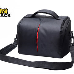 Kiwi Shack protective black waterproof DSLR camera shoulder bag with red interior accent zipper and padded strap.