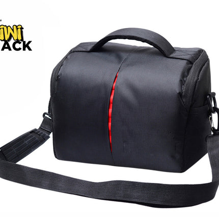 Kiwi Shack protective black waterproof DSLR camera shoulder bag with red interior accent zipper and padded strap.