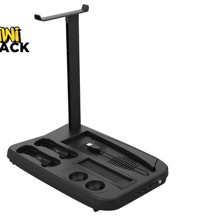 A black multi-function gaming headset stand and controller charging dock with an integrated vertical headphone holder, controller slots, a ribbed desk organizer base, and front USB ports, featuring a "Kiwi Shack" logo in the top left corner.