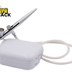 Airbrush with white case and cable on a white background, featuring Kiwi Shack logo.
