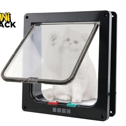 Black square pet cat door / flapped pet entry door installed in a frame with a clear pivoting transparent flap featuring a brush-sealed edge, colored locking latches at the bottom, a white cat sitting behind/visible through the transparency, and the Kiwi Shack logo watermark.