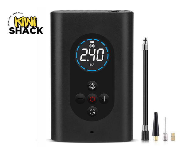 A black digital mini air pump by Kiwi Shack, featuring a circular display screen showing '2.40 BAR' and four interchangeable nozzle tips displayed to the right, on a white background.