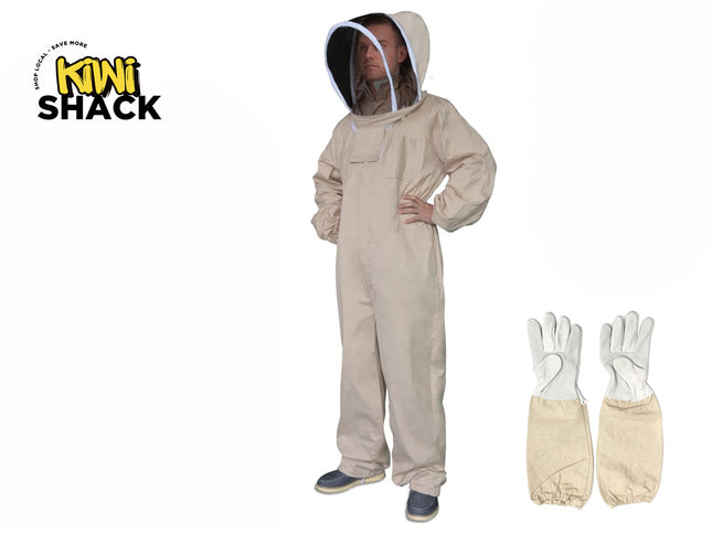 A person wearing a beige beekeeping suit with a fenced veil hood, standing next to a pair of matching leather-palmed beekeeping gloves, with the "Kiwi Shack" logo in the top left corner.