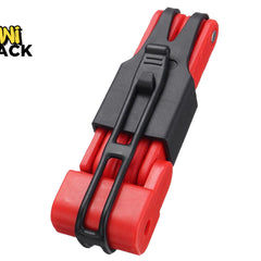Compact red and black folding bicycle lock / multi-segment folding lock secured with a black silicone/rubber carrying bracket and belt mount, featuring the Kiwi Shack logo watermark..