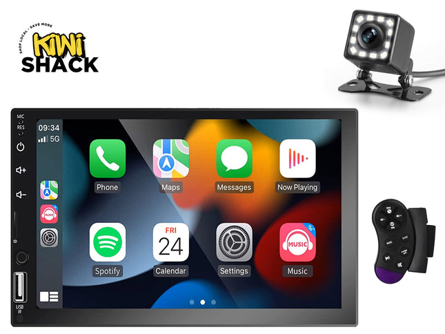 Car multimedia system with touchscreen display, camera, and remote control on a white background.