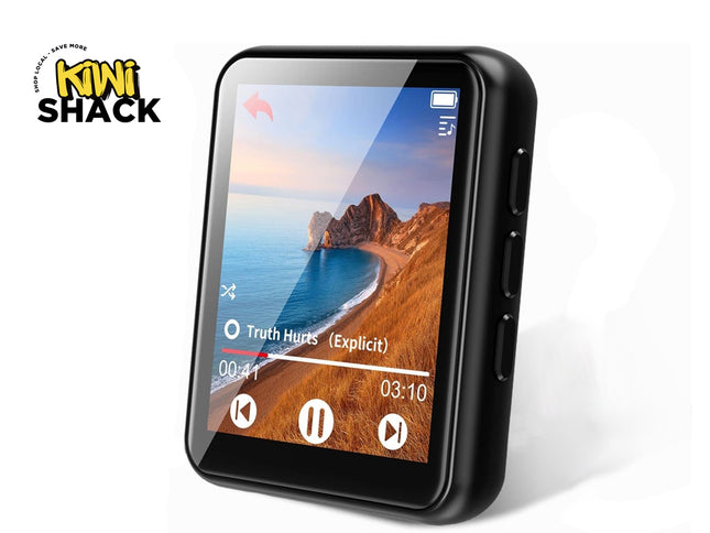 A compact black digital MP3 player with a touchscreen display showing a music playback interface with track controls and album art of a coastal landscape, featuring a "Kiwi Shack" logo in the top left corner.
