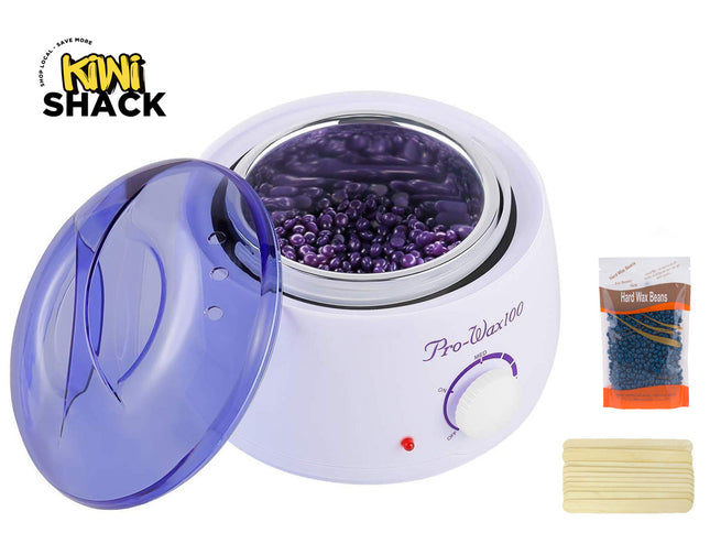White wax warmer with purple beads, a small packet, and a bar of soap on a white background. Kiwi Shack brand visible.