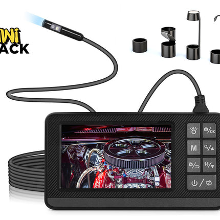 Digital camera with screen displaying an engine, surrounded by attachments on a white background, featuring the brand 'Kiwi Shack'.