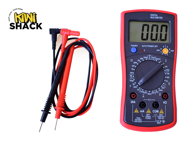 A digital multimeter with a red casing, LCD screen, rotary switch, and connected test probes, featuring the "Kiwi Shack" logo in the top-left corner.
