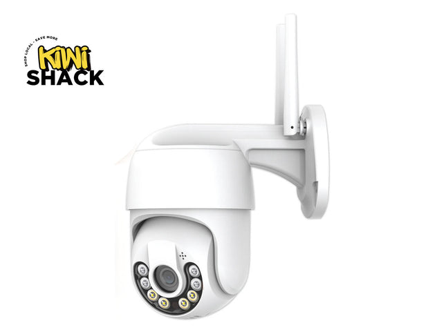 A white outdoor security camera with a dual antenna and a circular array of infrared LEDs, shown against a plain white background with a Kiwi Shack logo in the top-left corner.
