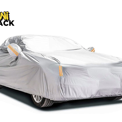 A silver car cover fitted over a car, shown on a white background with the KINI SHACK logo in the top-left corner.